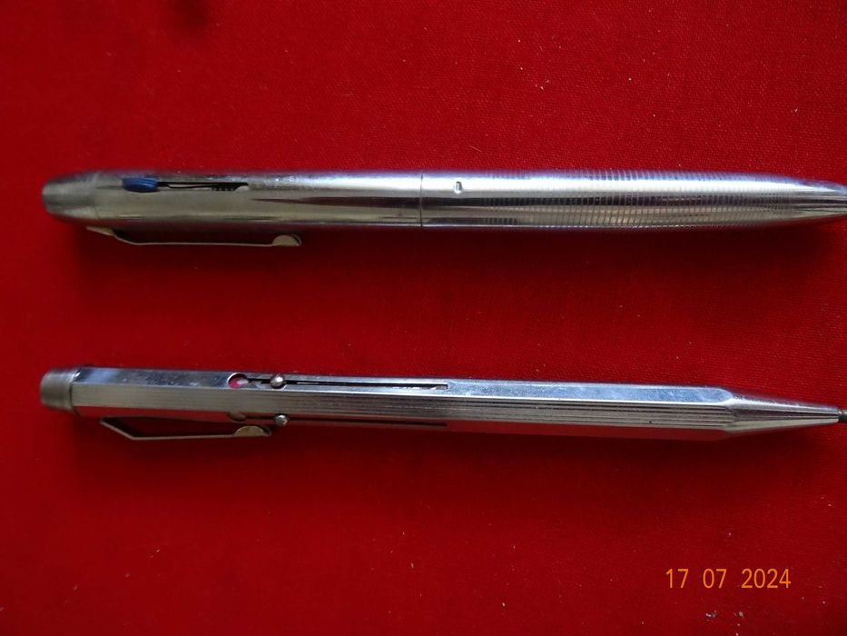 Doua pixuri metalice(cu 4 si 2 culori) ,din anii 1970