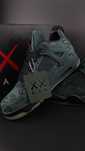 Air Jordan 4 Rerto KAWS + CADOU