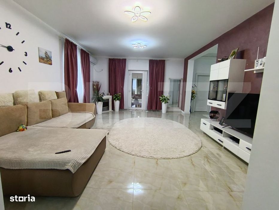 Casa ultra finisata si mobilata cu 3 camere 1 living si o terasa gener