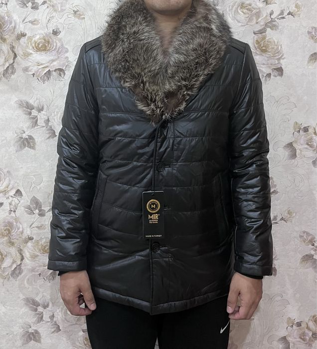 Продам новый пуховик с натуральным мехом