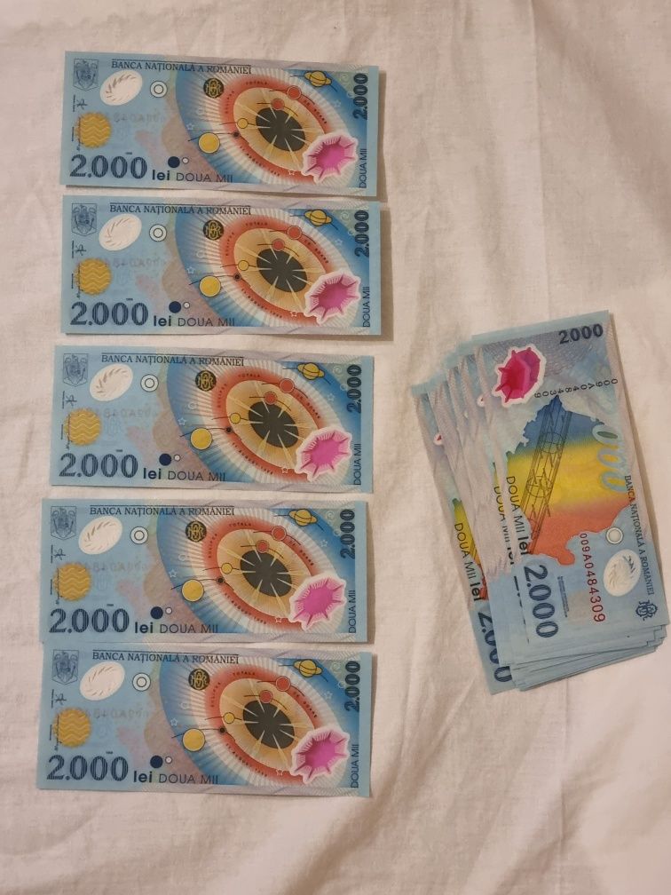 2000 lei 1999 eclipsa UNC consecutive, pliant si fisic intreg