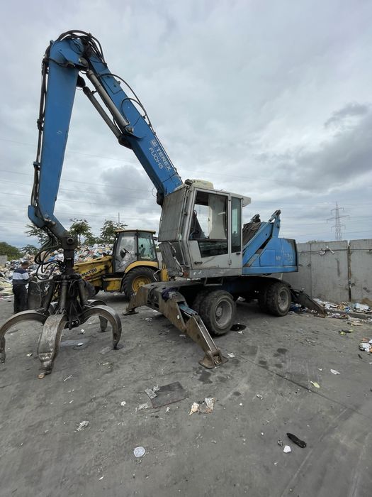 Fuchs MHL 320 excavator graifer - schimb auto/ teren
