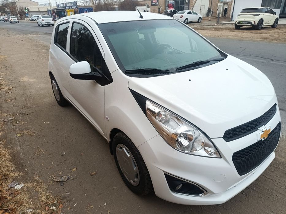 Спарк Оптима плйус машинаси сотилади холати яанги