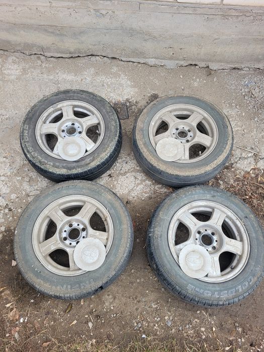 Диск покрышкамен