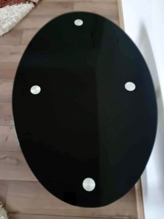 Măsuța de cafea din sticlă neagră