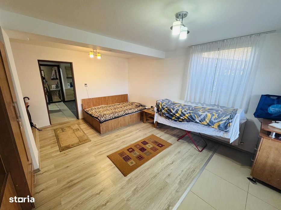 Se inchiriaza garsoniera 40mp  la vila cu curte privata/parcare Sarmas