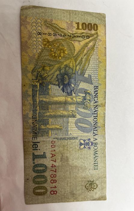 Bacnota 1000 lei, seria 001A, pastrata impecabil.
