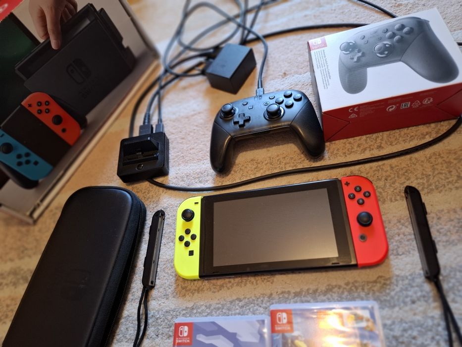 Nintendo switch + controller wireless + 3 jocuri