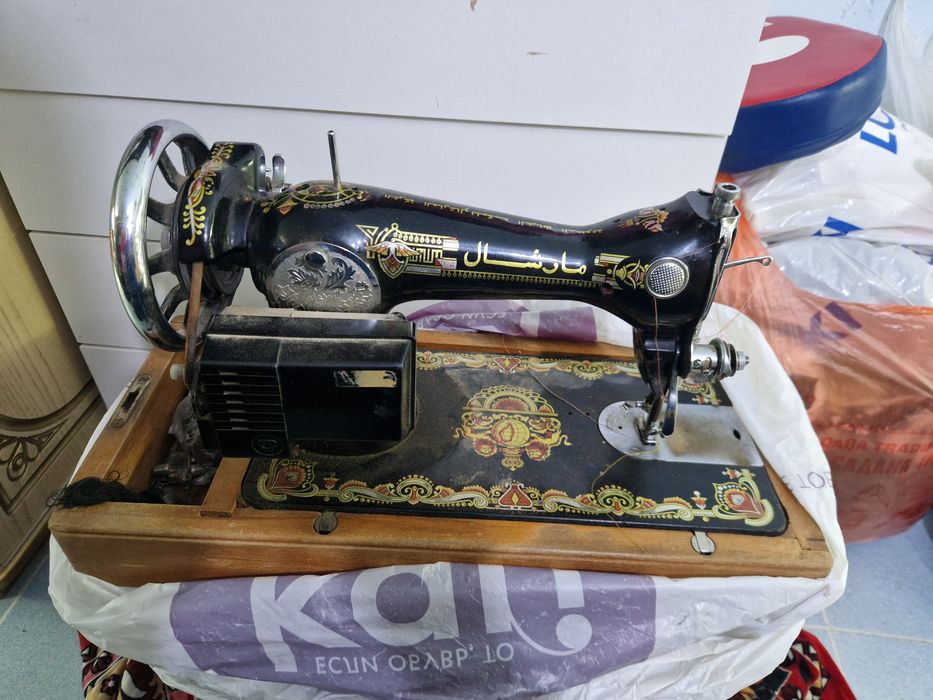 Швейная машина...