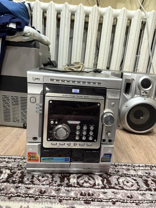 Музыкальный центр с dvd и караоке.