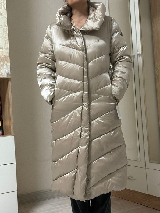 Продам пуховик новый.