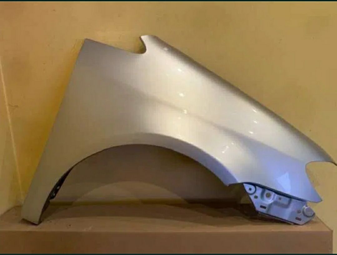 Aripa dreapta fata NOUA vopsita gri argintiu LA7W VW Touran 2007 -2011