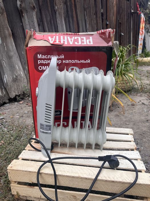 Продам мяслянный радиатор напольный