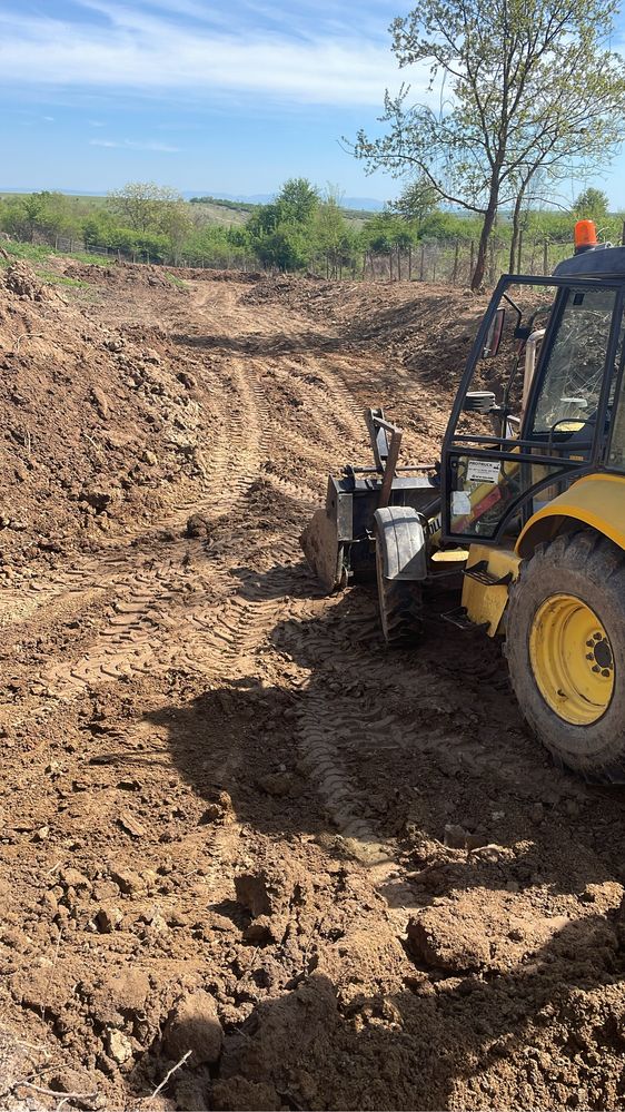 Buldoexcavator New Holland 2007