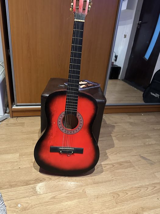 Chitara  acustica  doua la pret de una