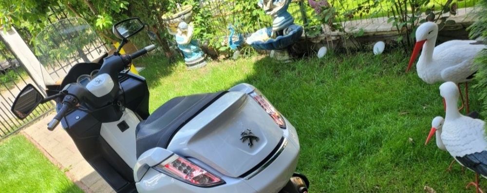 Scuter  125  cc abs