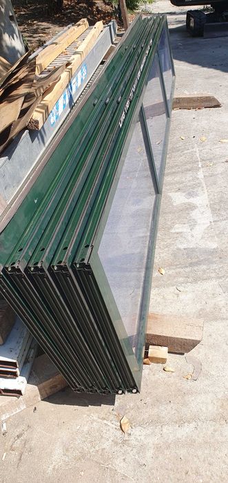 Vand porti,usi sectionale industriale 4x4m vitrate electrice HildTore.