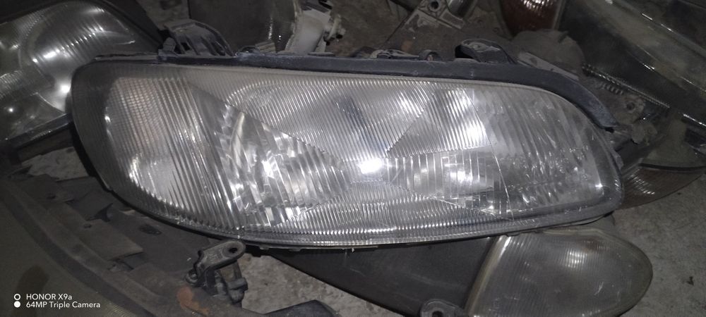 Опел Амега фара запчасти