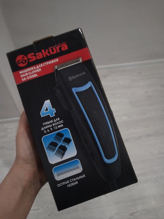 Машинка для стрижки .  Тример