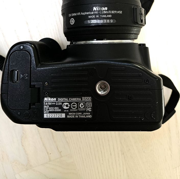 Nikon D3200l SLR camera with an 18-55mm VR lens.