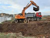 Ichiriere utilaje constructii buldoexcavator picon, excavator pe roti