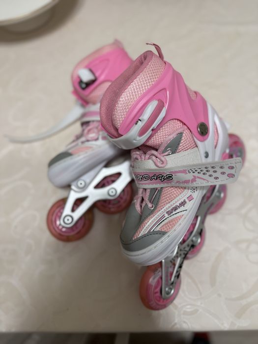 Продам роликовые коньки для девочки ,регулируемый размер 34–37