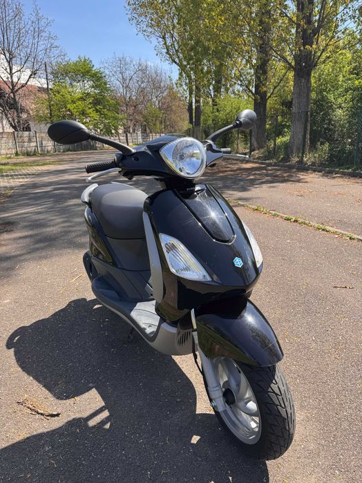 Scuter Piaggio FLY impecabil: 2 timpi, 49 cmc, doar 11.350 km+cadouri