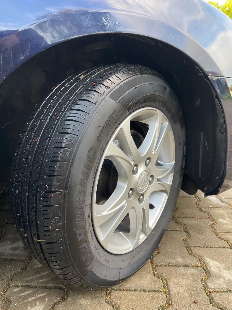 Mazda 3 1.6 MZR Sport Exclusive.