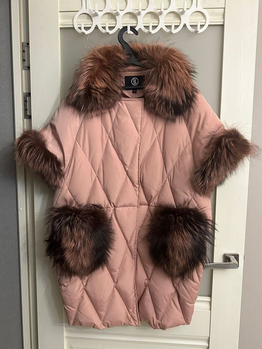 Пуховки безрукоавка