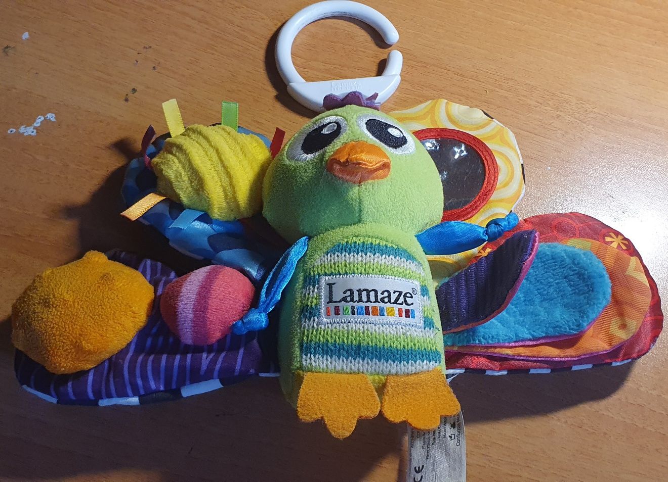 Lamaze Развивающая подвесная игрушка для малышей Павлин Жако