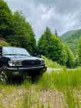 Toyota Land Cruiser j100 autoutilitară in 4