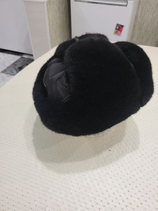 Шапку ушанку в отличном состояние