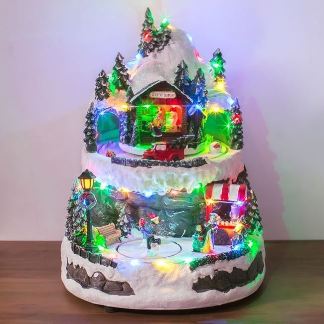 Музикална коледна сцена със светлина и движение