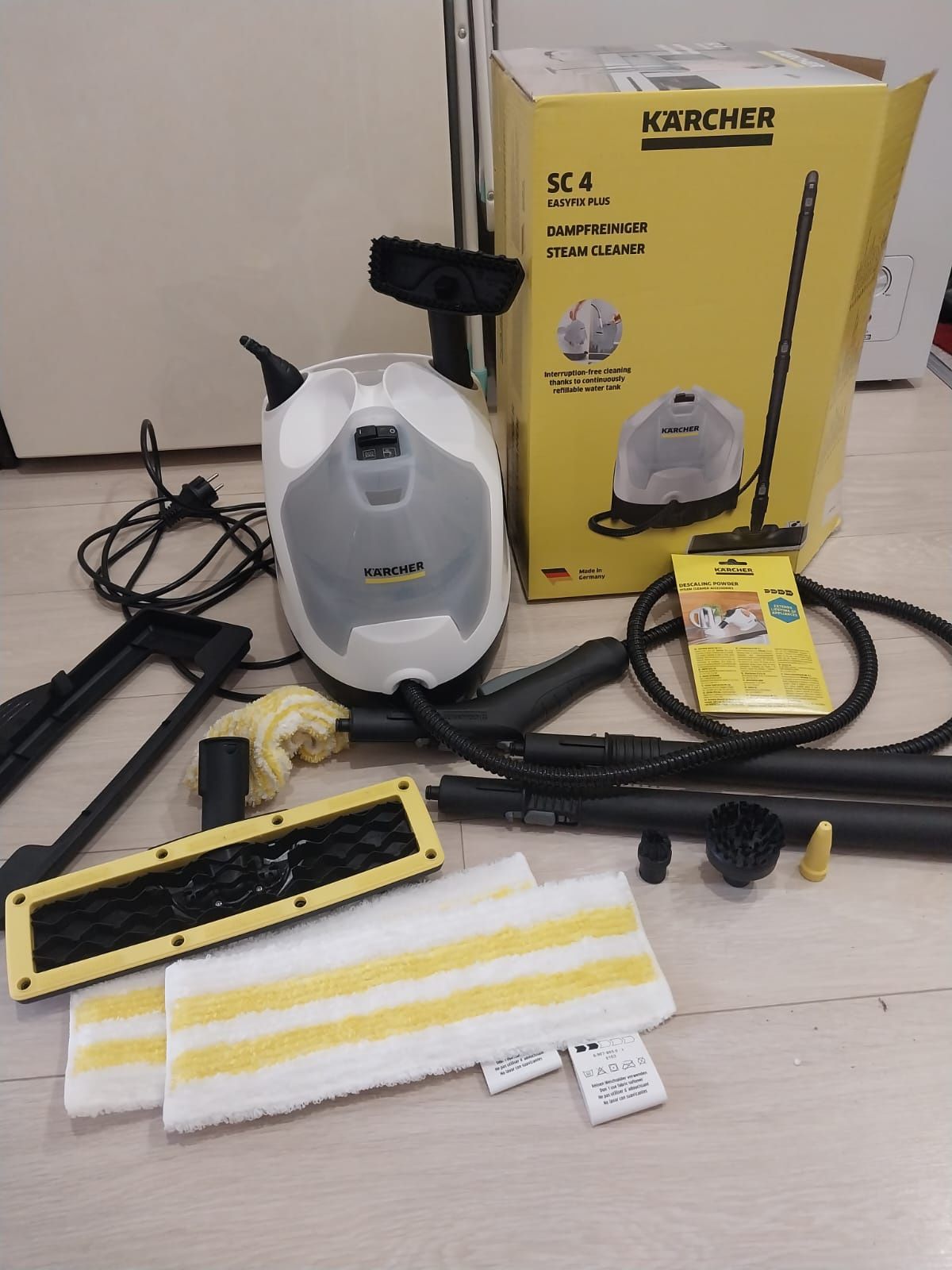 Профессиональный  пылесос и пароочиститель KARCHER