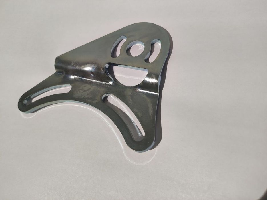 Регулируемата скоба за изпускателен клапан