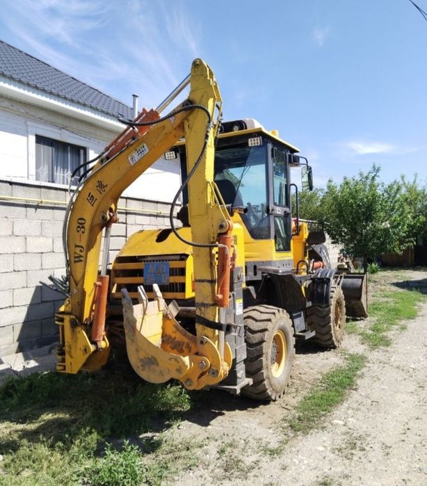 Услуги экскаватора погрузчика