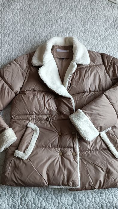 Продам женскую куртку