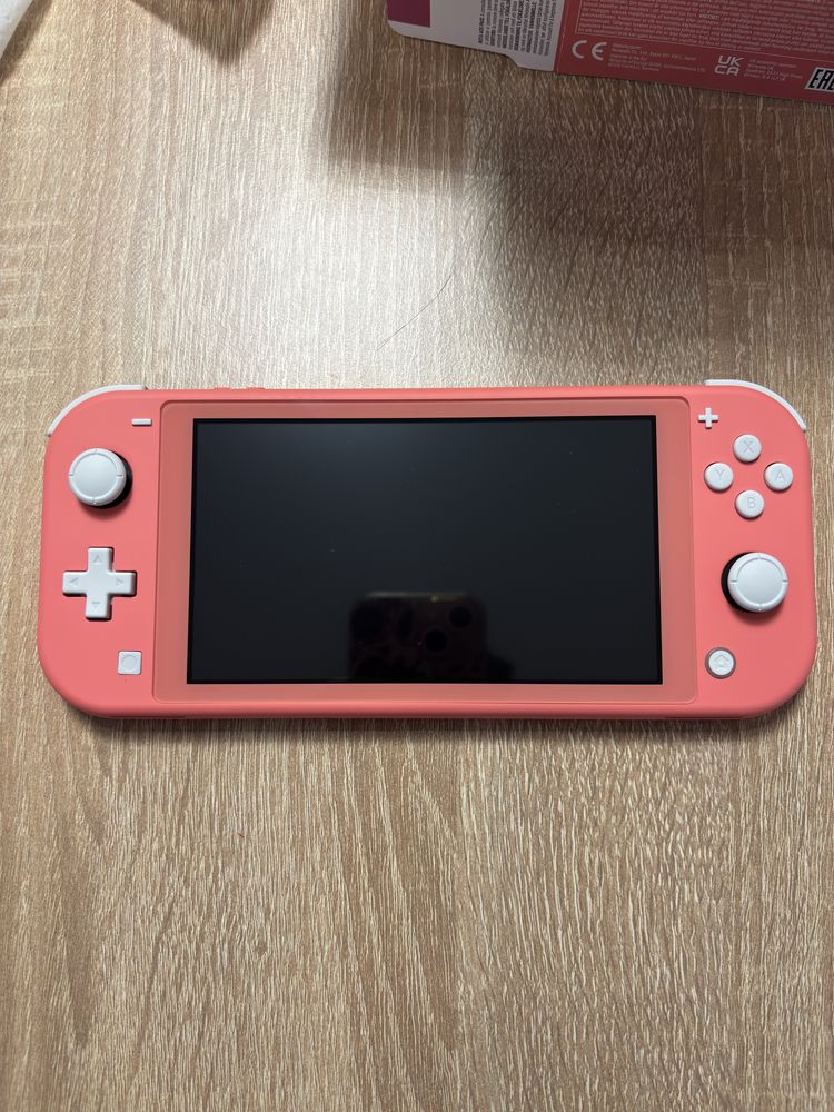 Чисто нова конзола Nintendo Switch Lite Coral