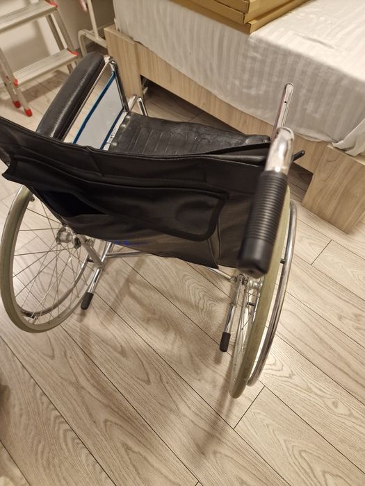 Carut pentru persoane cu handicap de miscare