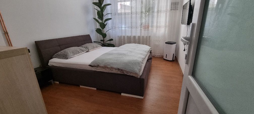 Apartament intr-un imobil cu etaj