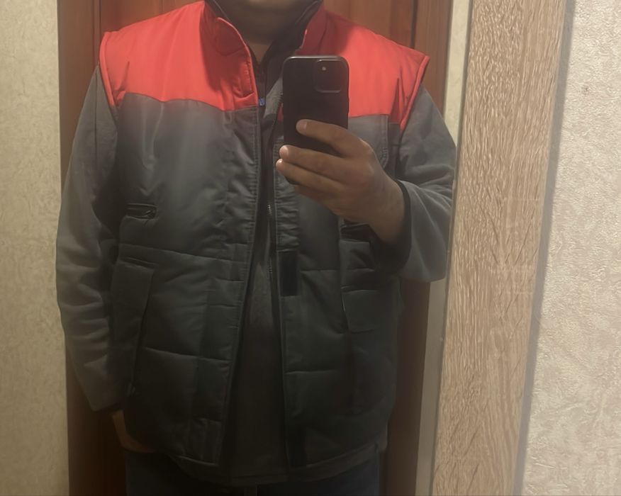 Продам жилет теплылый