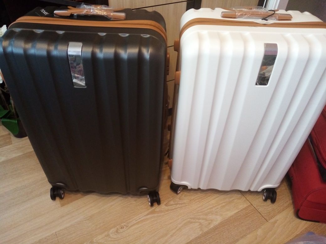 2 броя нови куфари       .