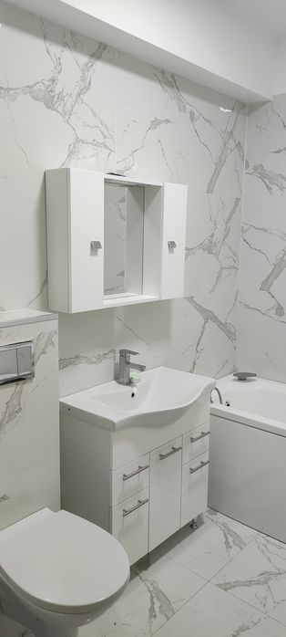 Închiriez sau vand la pretul de 70000 euro ap cu 2 camere in cartierul