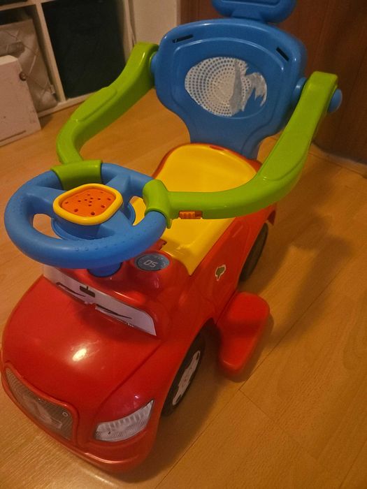 Masinuta Ride-On 4 in 1 Dolu Step Car Rosu pentru copii intre 1-3 ani