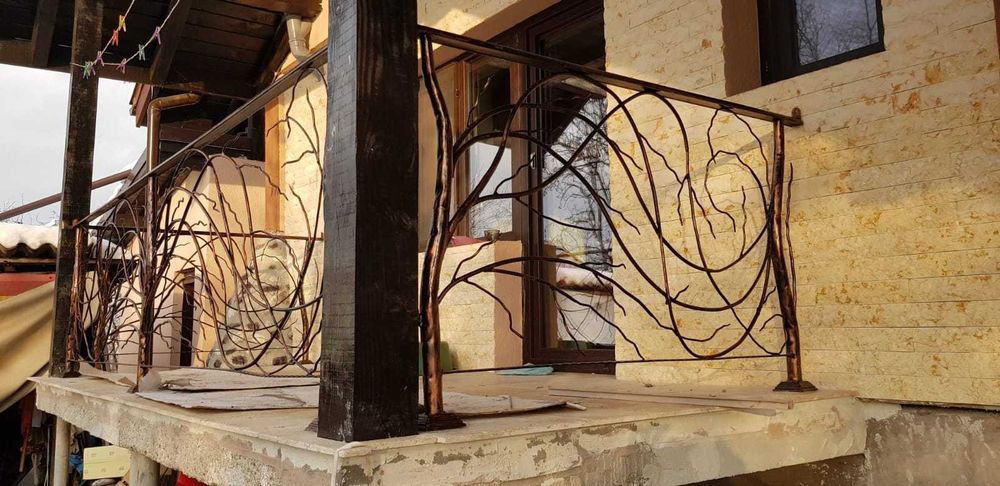 Porti din fier forjat,balustrade din fier forjat,copertine din fier