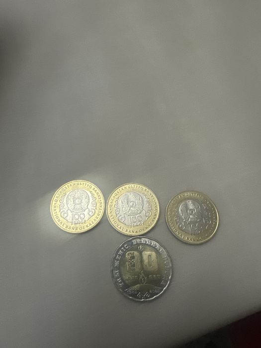 100 теңге 200теңге