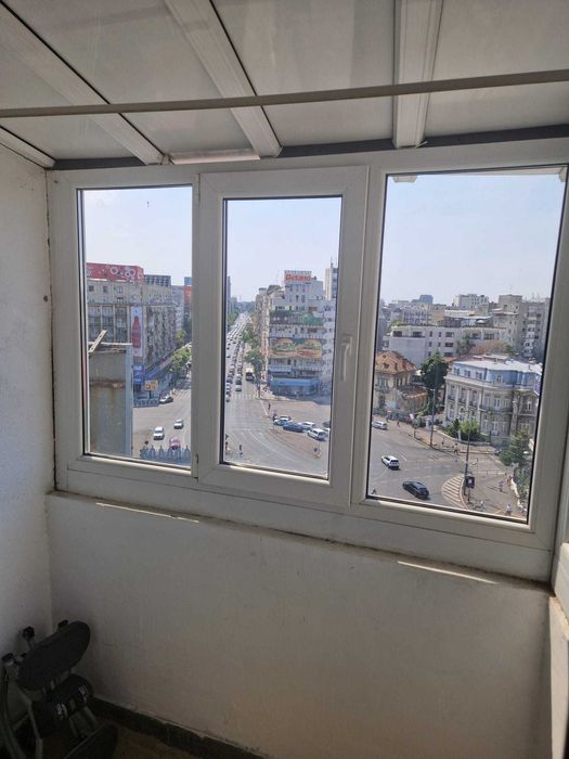 Garsoniera Piata Romana