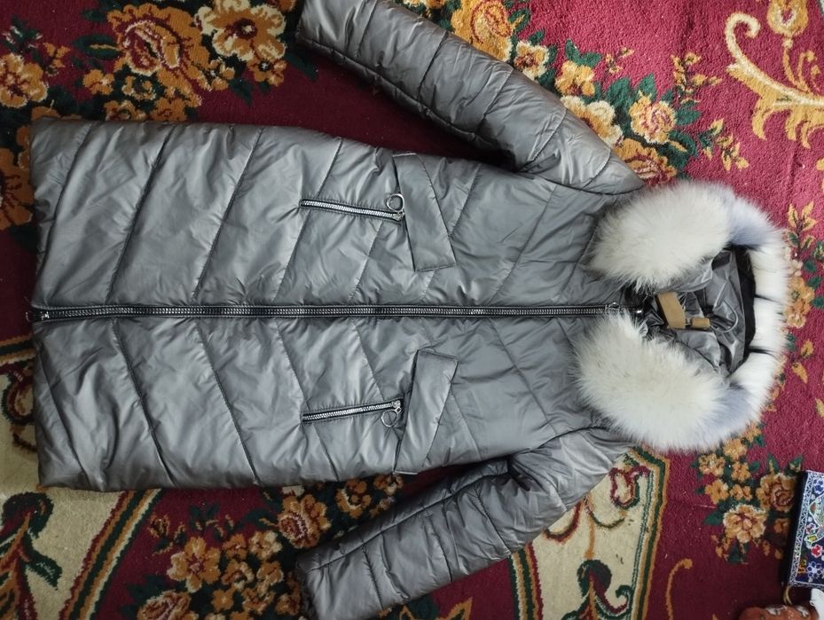 Женский пуховик.