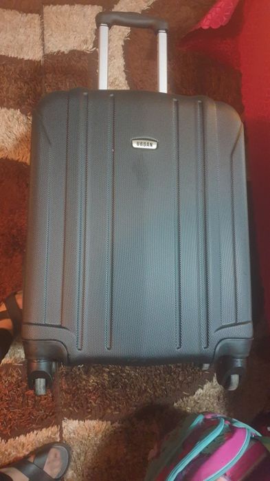 Куфар нов с 4 колелца