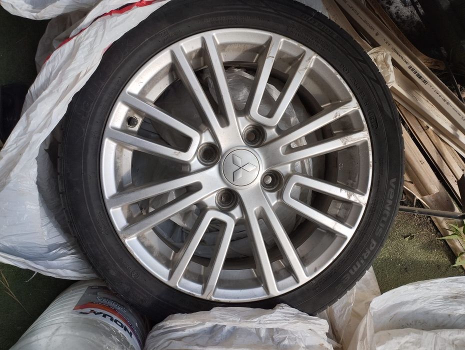 Set 4 Jante aliaj originale Mitsubishi 16" + Anvelope